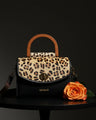 Leather handbag with leopard print and flap – IULIUS 