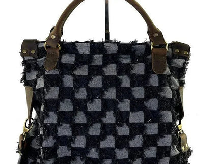 Handcrafted checkered tote bag with frayed texture and leather handles, luxury designer accessory