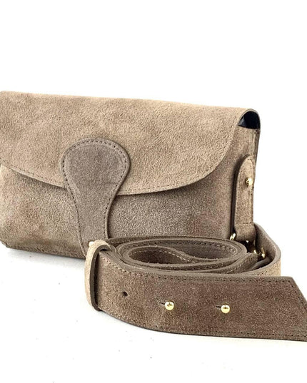 Tan suede clutch bag with adjustable strap and gold hardware, handcrafted luxury accessory