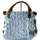 Light blue frayed denim handbag with brown leather handles and hardware, luxury designer accessory