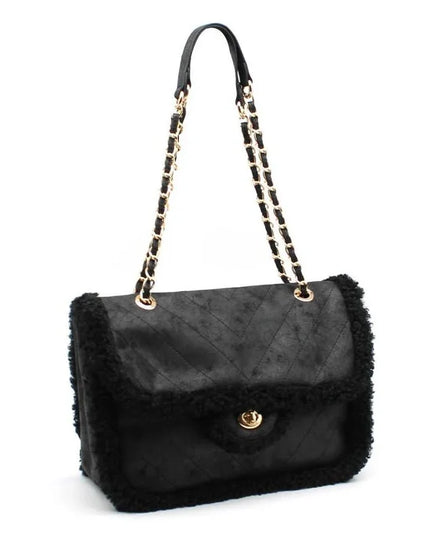 Luxury black quilted handbag with shearling trim and gold chain strap, designer fashion accessory