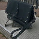 Brunocenere Schwarze Schultertasche mit Pyramidenbolzen – Handmade Italy