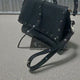 Brunocenere Schwarze Schultertasche mit Pyramidenbolzen – Handmade Italy