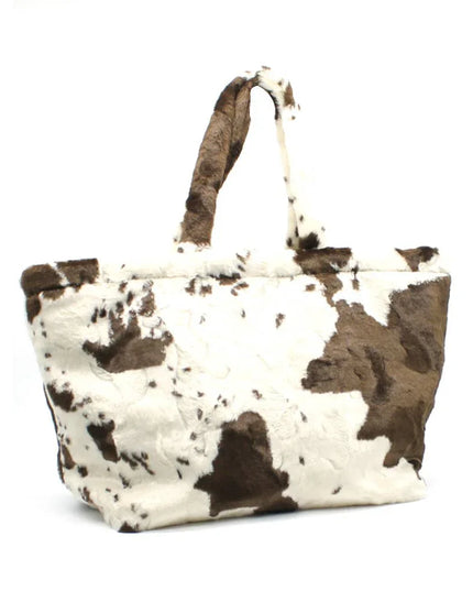 Luxury cowhide tote bag with brown and white pattern, handcrafted designer accessory