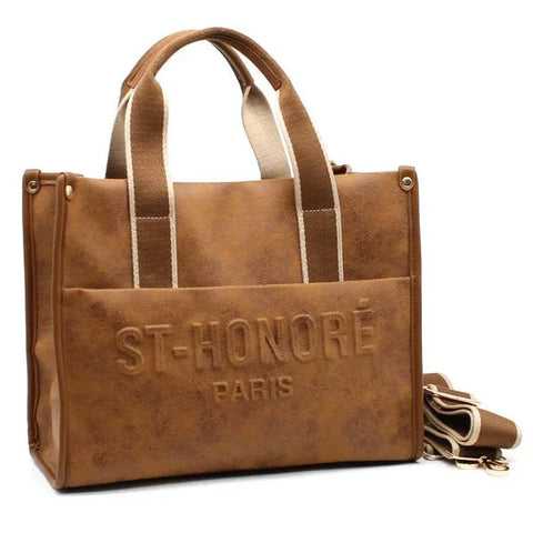 Brown leather tote bag with ST-HONORÉ PARIS embossing, canvas straps, and detachable shoulder strap