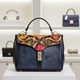 Rossie Viren Mini Leather Handtasche