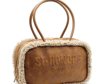 Luxury brown leather handbag with shearling trim and 'ST-HONORÉ PARIS' embossing, designer accessory