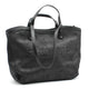 Black suede tote bag with embossed St-Honoré Paris logo, luxury designer handbag