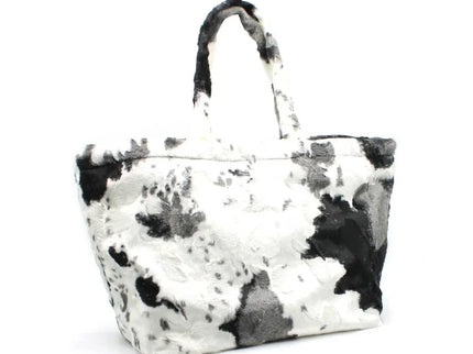 Black and white cow print faux fur tote bag with top handles, luxury designer accessory