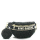 Black fluffy Rive Gauche fanny pack with gold zipper and matching pom-pom accessory, luxury designer style