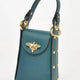 Teal leather handbag with gold bee clasp and studded details, luxury designer accessory
