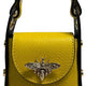 Vibrant yellow leather handbag with black trim and metallic bee embellishment, luxury designer accessory.