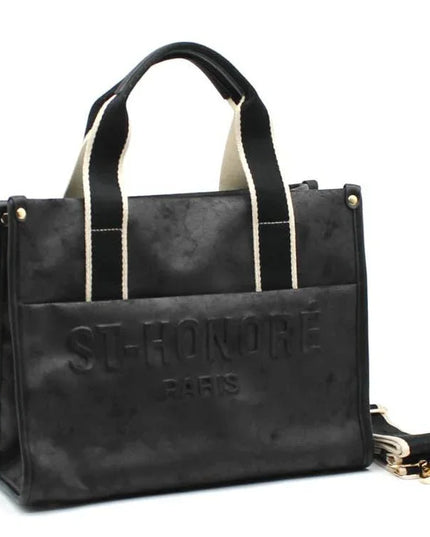 Black leather tote bag with 'ST-HONORÉ PARIS' embossing, gold hardware, and contrast straps
