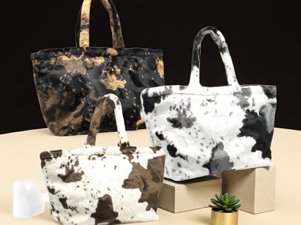 Printed bag with cow pattern and long, soft handles 