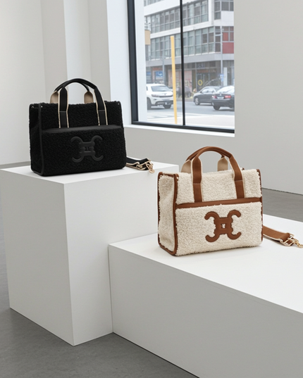 Moumoute handbag with E-logo