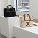 Moumoute Handtasche mit E-Logo