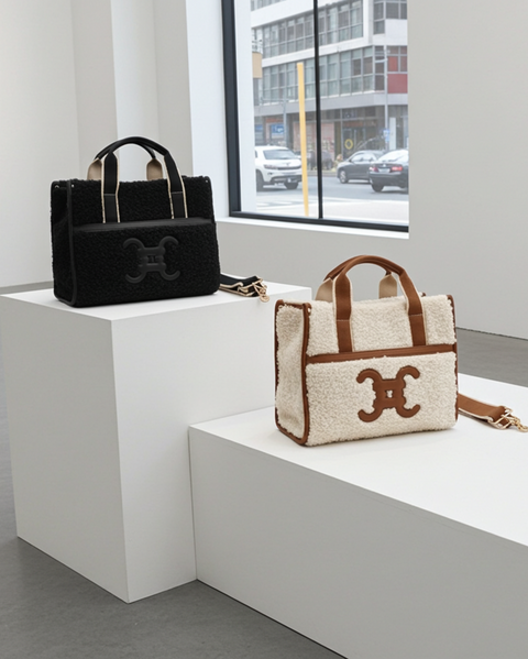 Moumoute Handtasche mit E-Logo