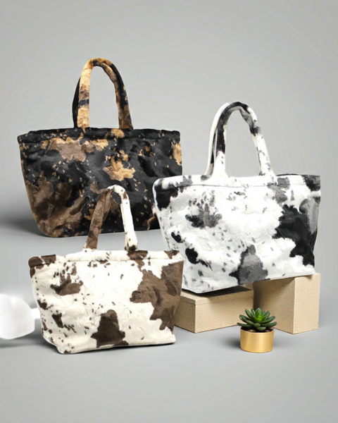 Bedruckte Tasche mit Kuhmuster und langen, weichen Henkeln
