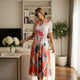 Rosa-oranges Blumen-Plissee-Midikleid GRAMERCY • BYMANYC ® New York