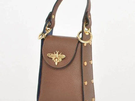 Brown leather handbag with gold bee clasp and studded details, luxury designer accessory
