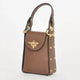 Brown leather handbag with gold bee clasp and studded details, luxury designer accessory