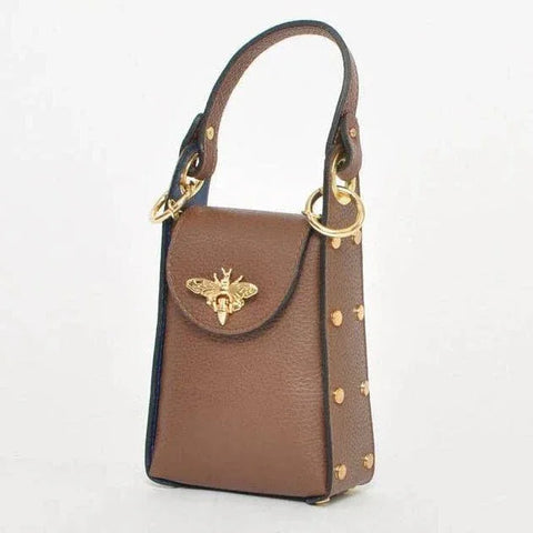 Brown leather handbag with gold bee clasp and studded details, luxury designer accessory