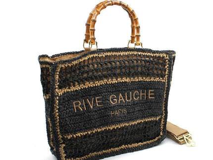 Black woven tote bag with 'RIVE GAUCHE PARIS' embroidery, bamboo handles, and gold hardware