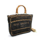 Black woven tote bag with 'RIVE GAUCHE PARIS' embroidery, bamboo handles, and gold hardware