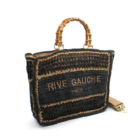 Black woven tote bag with 'RIVE GAUCHE PARIS' embroidery, bamboo handles, and gold hardware
