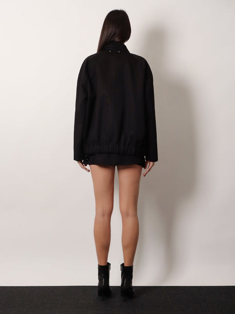 Black denim jacket with floral details in sequins and crystals