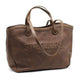 Brown leather tote bag with embossed ST-HONORÉ PARIS logo, dual handles, and shoulder strap for everyday luxury style.