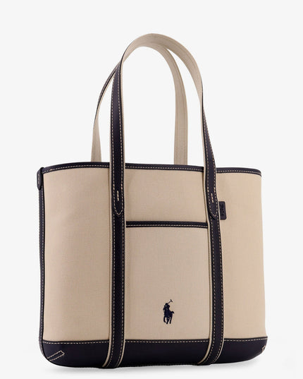 Canvas shoulder bag with embroidered logo on the front