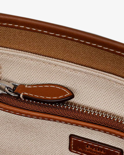 Canvas shoulder bag with embroidered logo on the front
