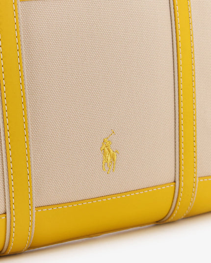 Canvas shoulder bag with embroidered logo on the front