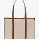 Canvas shoulder bag with embroidered logo on the front