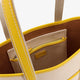 Canvas shoulder bag with embroidered logo on the front