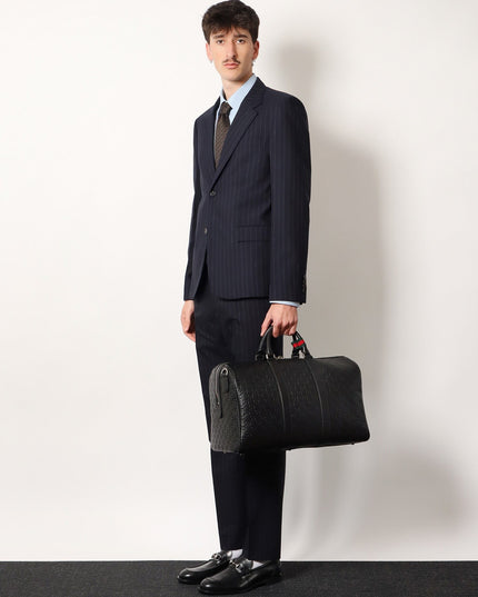 Coated canvas GG Emblem travel bag with GG motif
