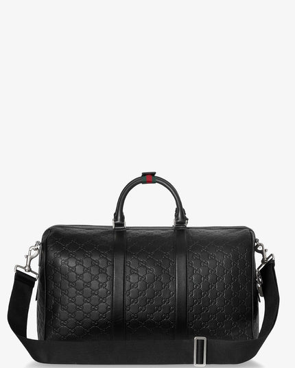 Coated canvas GG Emblem travel bag with GG motif