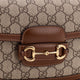 Coated canvas Gucci Horsebit 1955 crossbody bag with GG Supreme motif