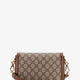 Coated canvas Gucci Horsebit 1955 crossbody bag with GG Supreme motif