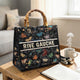 RIVE GAUCHE Handtasche mit Schmetterlings- und Blumenmuster