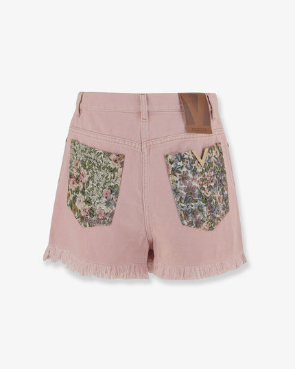 Denim shorts with frayed edges