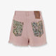 Denim shorts with frayed edges