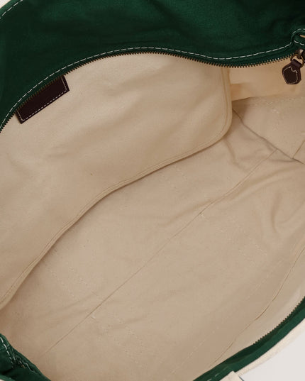 Denim shoulder bag with embroidered logo on the front