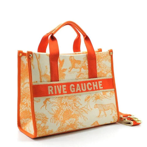 Orange and cream tote bag with 'RIVE GAUCHE' text and animal print, featuring luxury designer style