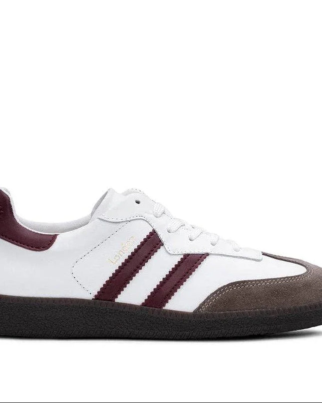 White and burgundy retro sneaker with three stripes, suede toe, and gum sole for casual style