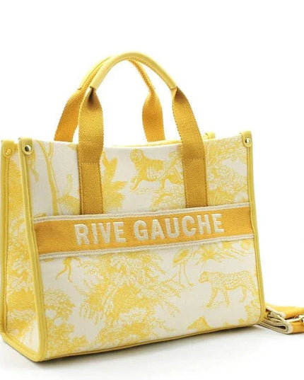 Yellow and cream tote bag with 'RIVE GAUCHE' text and animal print, luxury designer accessory