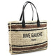 Striped woven tote bag with 'RIVE GAUCHE PARIS' print and black leather handles, luxury designer accessory