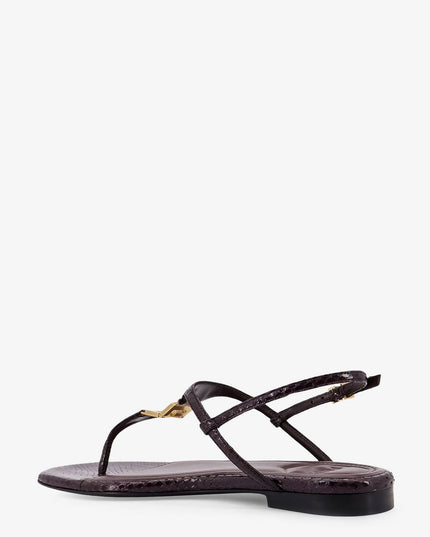 Fold leather sandals with reptile effect