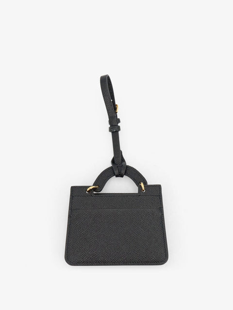 Hammered leather card holder with metal logo tag